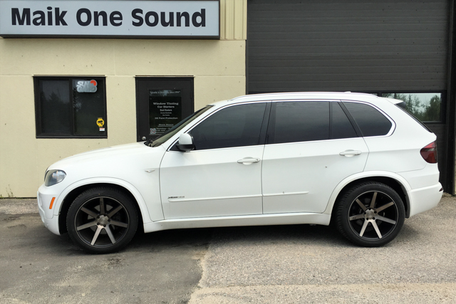 2010 BMW X5 with professional window tint in North Bay